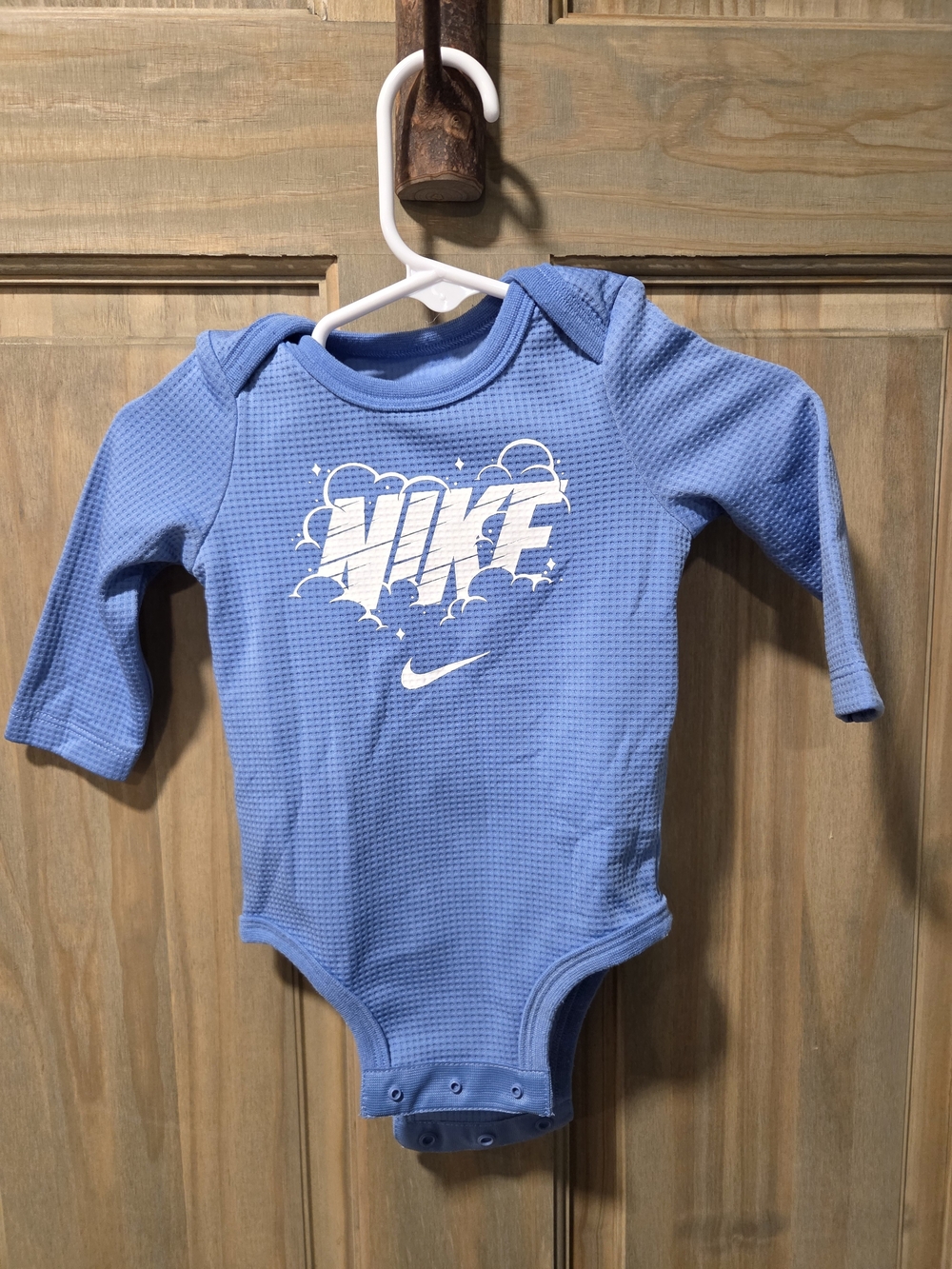 NWOT Nike Light Blue Long-Sleeve Baby Bodysuit with White Logo